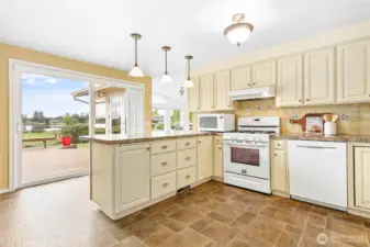 The large Trex deck is conveniently located off of the kitchen.