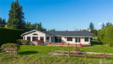 The backyard is nice and flat and great for outdoor activities.