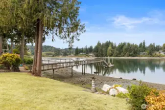 1314 NE Petterson Rd, Keyport. Walkway to 190 foot share dock.  No bank, bulkheaded beach on Liberty Bay.