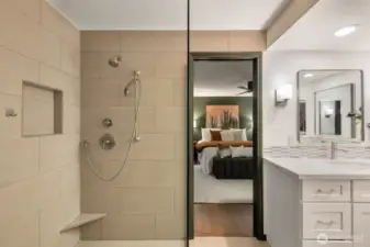 Primary shower, looking back into bedroom