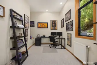 Moving back over to the southern wing of the home you find the home office. A nice private setting with pretty views.