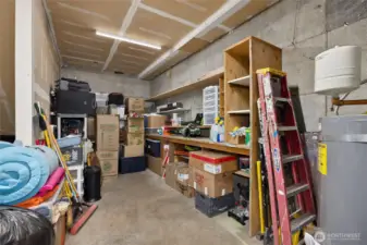 The handy and versatile shop area off of the garage. This space is plumbed for a sink.