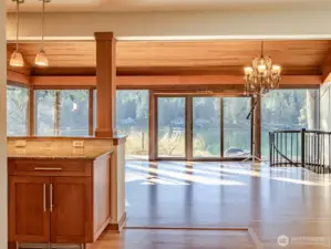 Formal entry hallway, wood flooring, opens to magnificent great room with stunning 180 degree water views.