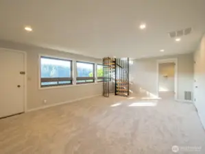 To The Beach/Dock is easy access from the recreational room downstairs, access to 2nd primary bedroom with ensuite in background