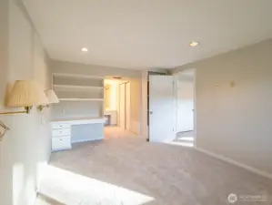 2nd primary suite on lower level has vanity, separate from the deluxe shower and commode.