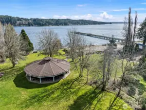 Stroll from the home to the waterfront pier, boat launch, beach, and park.