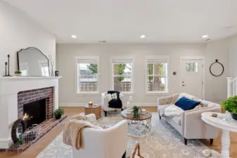 Enjoy the marine views from the living room, dining area, and kitchen.  Upstairs, the primary suite features a spectacular view, a great spot for morning coffee.