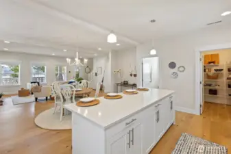 The kitchen has ample storage and a large pantry.