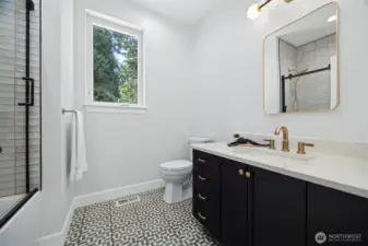 Full bath on the main just outside the home office.