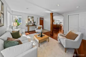 Formal living room with beautiful cherry hardwoods throughout the main floor.