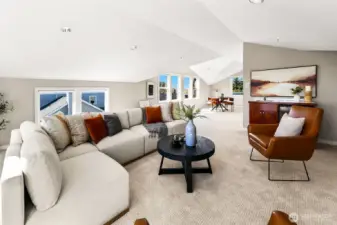 Easily create a 2nd primary suite up here or just enjoy as the fabulous view rec room it is. Gas fireplace, wet bar, half bathroom (can add a shower or a tub) & big view deck too.