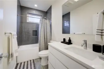 Second full bathroom on second level. Radiant heated floor.