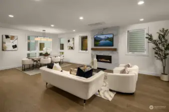 Living room opens to Kitchen and Dining areas.