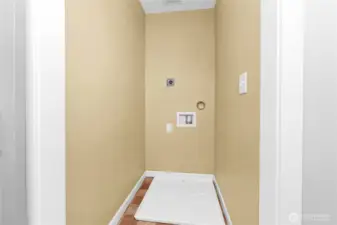 Second floor laundry room, designed for a stackable washer/dryer.