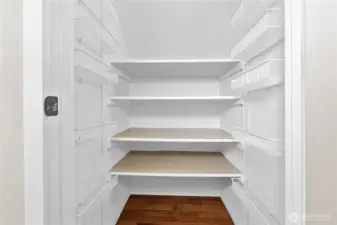 Convenient walk-in pantry...