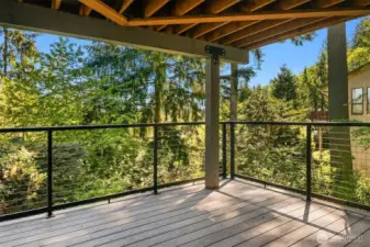 The covered deck on the 2nd level is offered from the family room.