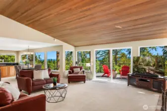 The entry leads to the spacious and sunny living room.