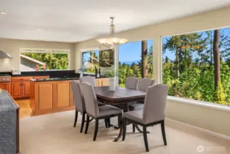 The large picture windows capture the peaceful, territorial views.