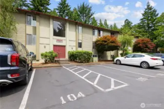 Parking space 104 next to entry