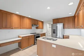 New Stainless Steel appliances and quartz countertops.
