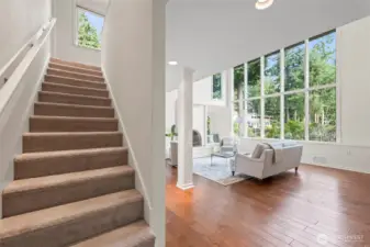 Stairs to second floor where you'll find the primary suite and another bedroom with adjoining bath.