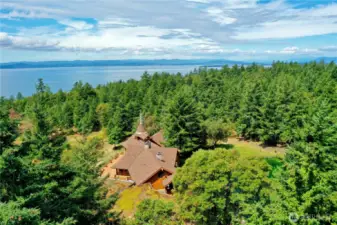 Looking to the North, the main home has SW to NE exposure for abundant natural light