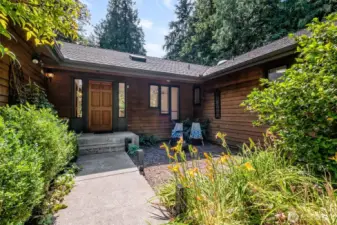 Tucked away down a quiet gravel drive shared by just one other home, this exceptional custom-built residence offers nearly 3,700 square feet of living space and sits proudly on a serene 5.4-acre parcel in the picturesque Hobart community.