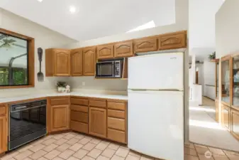 Three-quarter-height non-load-bearing wall can be easily removed and wall opened up to create a great room of your dreams!