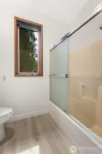 Two separate spaces in this primary bathroom - the layout you want, pick your finishes! New flooring!