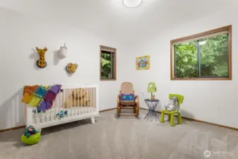 Two additional bedrooms are located on the main floor.