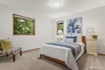 Second bedroom, both have new carpet and two windows.