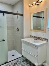 Stylish floating vanity in main floor bath