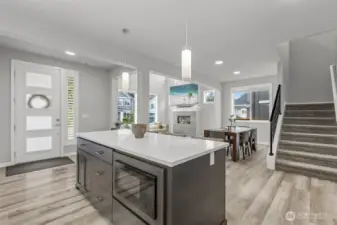 The open layout  highlights tall ceilings, big windows, and sightlines that show off a home’s best features.
