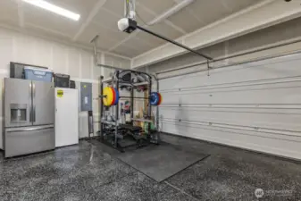 Look at this clean garage with polyurea coated flooring.