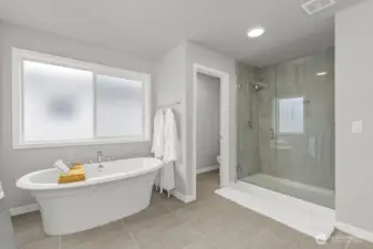 Soak away the day in the spa like 5-piece bath.