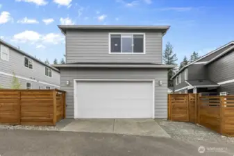 Alley-access garage for convenient entry and added curb appeal at the front.
