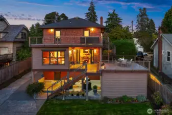 Easy indoor-outdoor flow is offered from three separate levels spilling out to an oversized lot with gardening and play spaces.