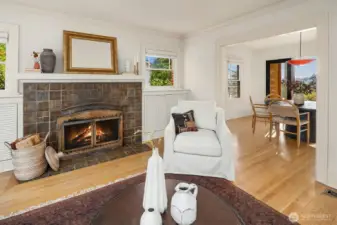 Original tiled fireplace adds character and a cozy place to relax.