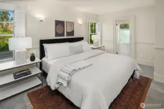 Upstairs is the primary bedroom with bath and walk-in closet.