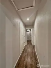 Split floor plan hallway view to Guest Beds/Bath