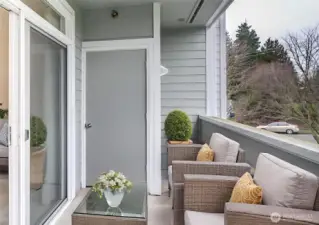 Deck off Primary Suite .  Water tank closet in back. Facing East.