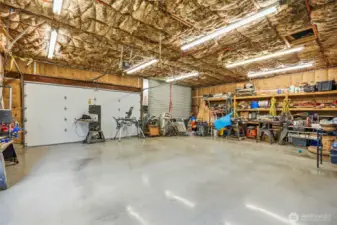 Massive Shop with overhead lighting and fully insulated.