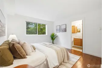 The generously sized primary bedroom, in-unit laundry, and thoughtful layout make everyday living easy