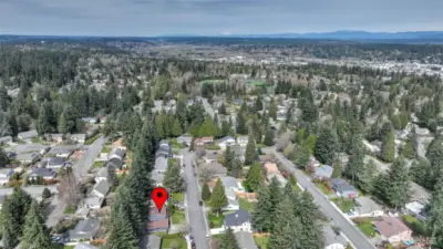 This shot shows the house and Grass Lawn Park just above center in this image.