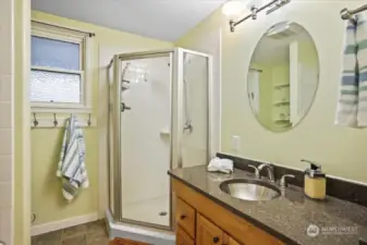 Th primary bath features a walk-in shower and a tub/shower combo.