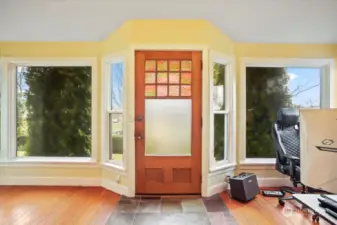 The windows in this front bonus space allow endless light to stream into the home.