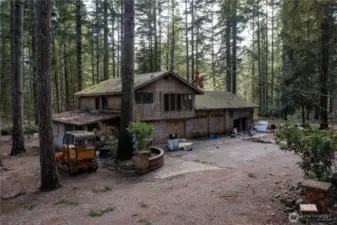 There's lots of room to improve the current home or start over with your own plans, bring your tools or a contractor to make a beautiful Estate with your own creek.