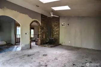 Upstairs living area looking towards stairway down to front door entry