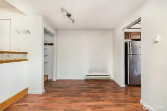 Dining room is conveniently situated between the living room and kitchen, creating a seamless flow for everyday living and entertaining.