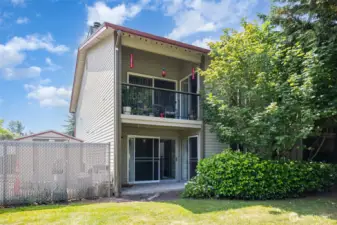 Great end unit surrounded by greenery.